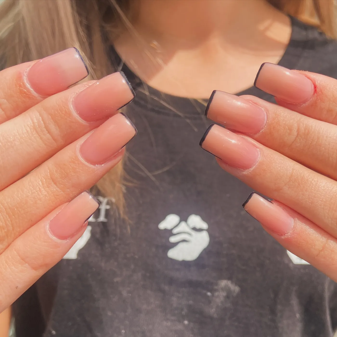 Gel manicure with black French tips