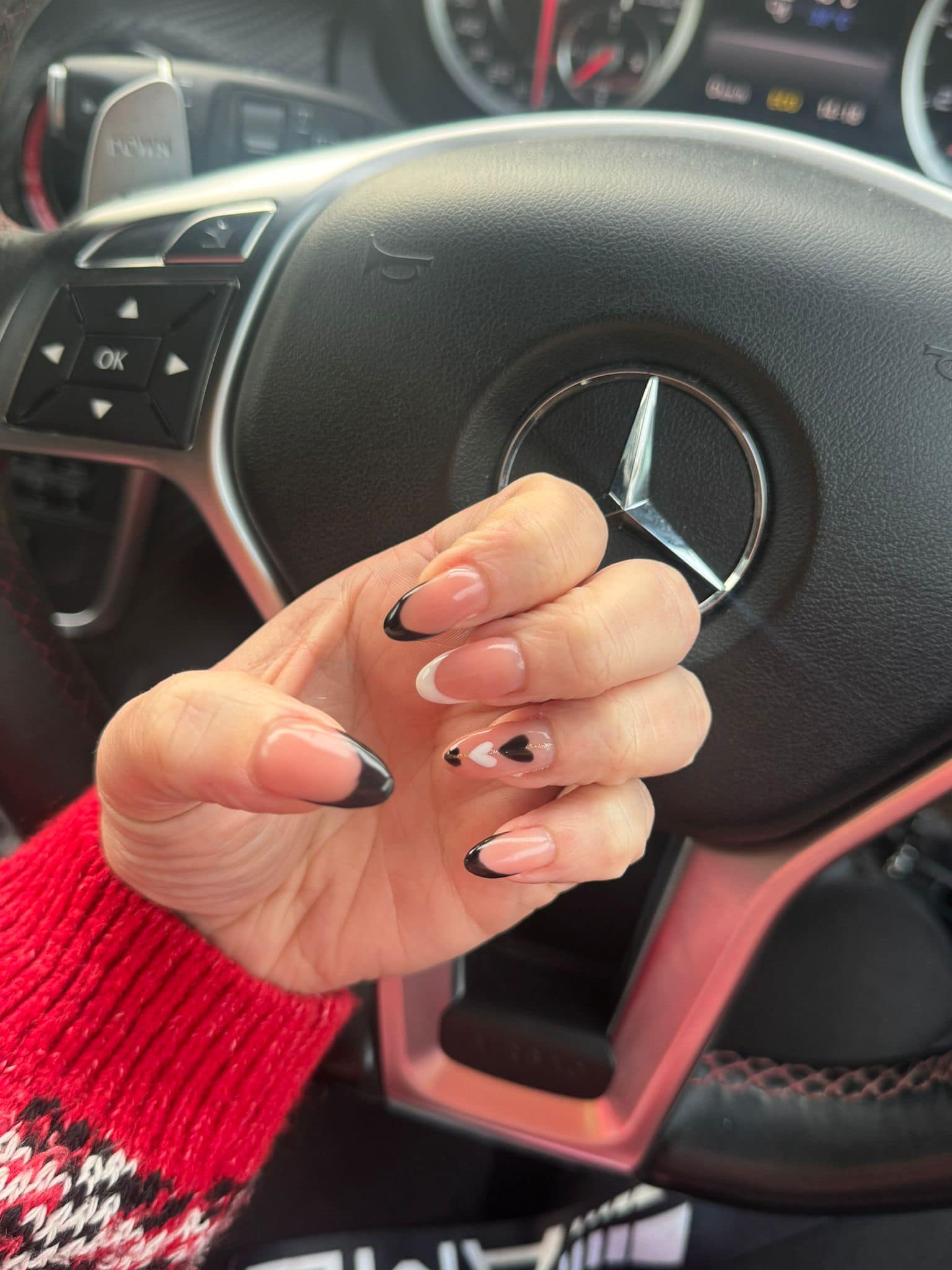 Gel manicure with heart nail art design